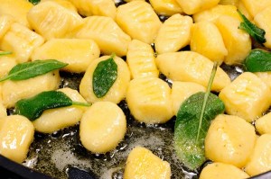 Homemade Gnocchi in butter sage sauce frying in a pan